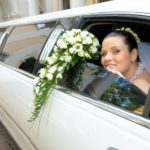 decorated white stretch wedding limo